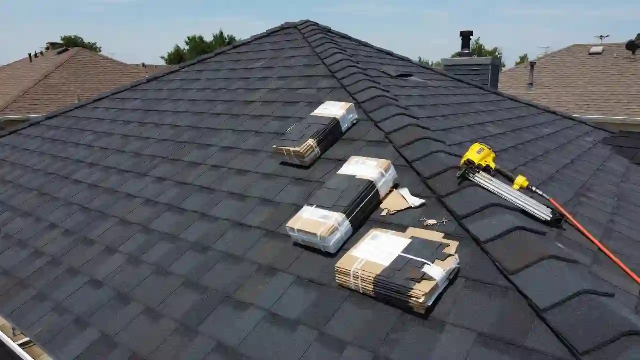 New architectural shingles on a house roof